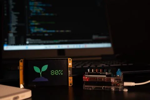 Soil moisture display screen with IoT microcontroller operation, Smart farm.. Stock Photos
