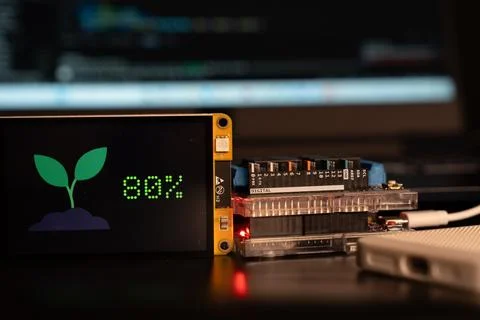 Soil moisture display screen with IoT microcontroller operation, Smart farm.. Stock Photos