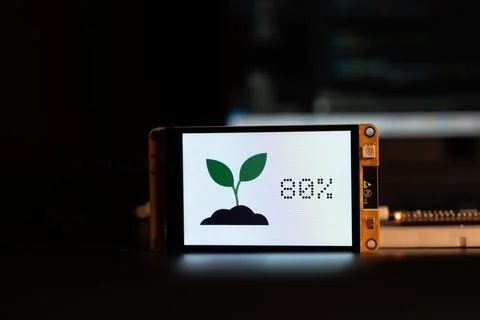 Soil moisture display screen with IoT microcontroller operation, Smart farm.. Stock Photos