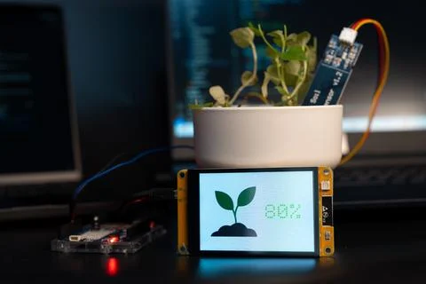 Soil moisture display screen with IoT microcontroller and soil moisture sen.. Stock Photos
