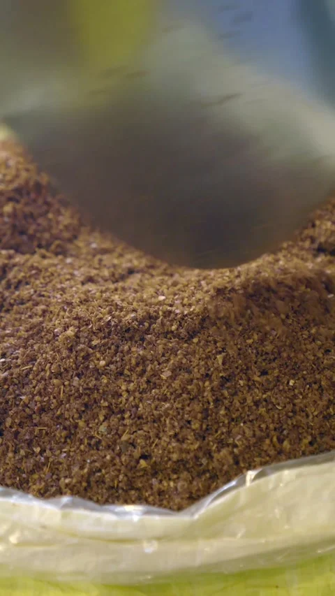 Soil pouring into a large bag Stock Footage 343354142