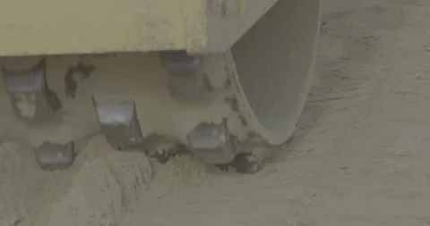 Soil roller compacts soil, sand, road roller with spikes Stock Footage 305641918
