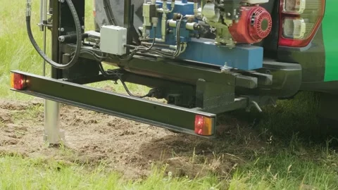Soil Sampling. A vehicle with special equipment collects soil samples for analys Stock Footage 134286281
