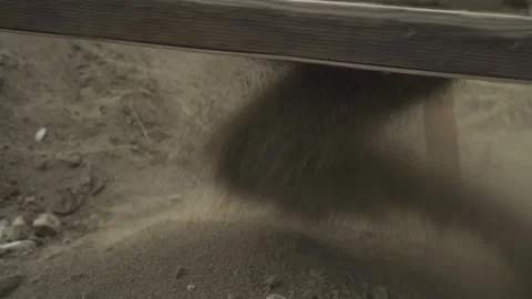 The soil is sifted through a sieve. close-up. Archaeological excavations Stock Footage 250388495