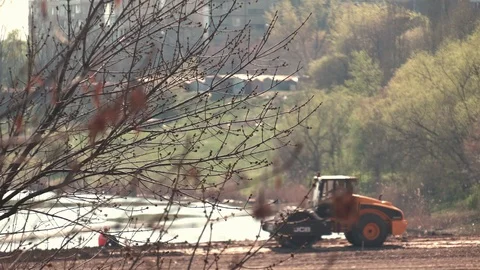 Soil skating rink work to seal ground the base of road. Stock Footage 128250313