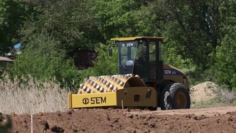 Soil skating rink work to seal ground the base of road. Stock Footage 130407520