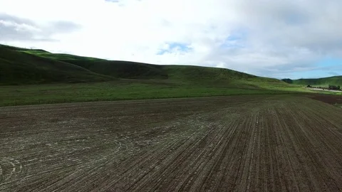 Soiled field shot from copter Stock Footage 79336351