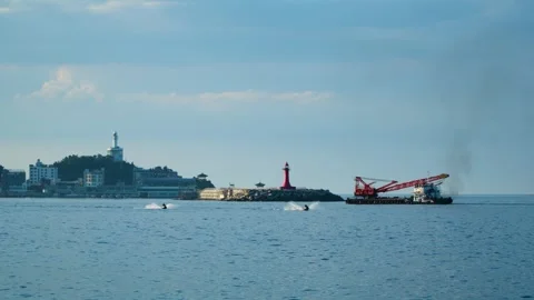 Sokcho Harbour with View of Lighthouse Observatory, Moving Dredging Video stock 250160160