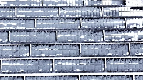 Solar array experiencing reduced efficiency due to accumulating snow on Stock Footage 330969057
