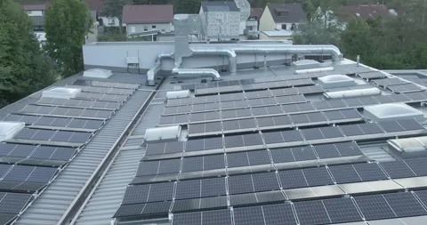 Solar Array On Industrial Roof With Dense Modules, Close Overhead Aerial View Stock Footage 340677068