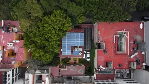 Solar array mounted on the rooftop of a house in Mexico City, 4K Stock Footage 159028826