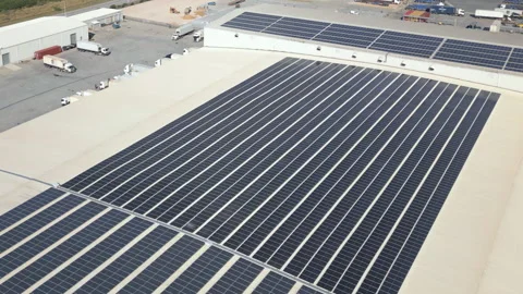 Solar Array Roof of Cold Storage Warehouse with Active Truck Yard 스톡 동영상 338027566