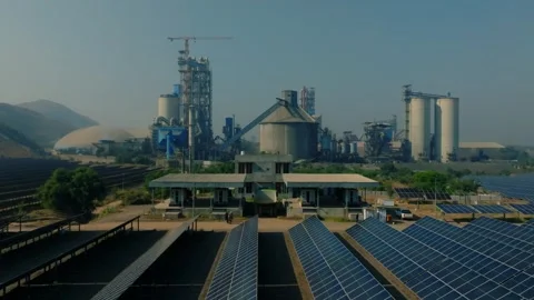 Solar array supplying renewable energy to a large cement factory in Pakistan Stock Footage 332527049