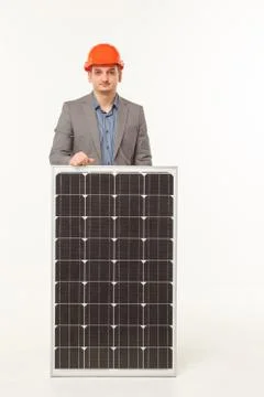Solar battery builder man Stock Photos