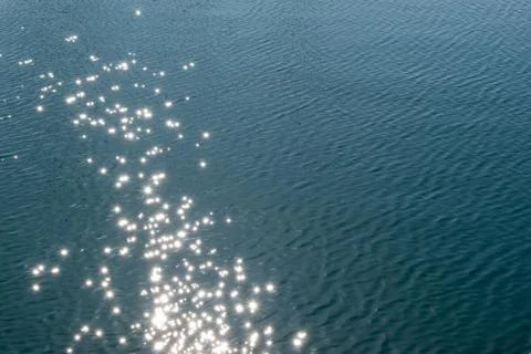 Solar bright path on the sea surface Stock Photos