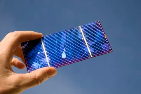 Solar cell in a hand Stock Photos