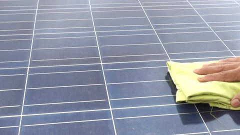 Solar cell panels are cleaned with fabric. Stock Footage 108075859