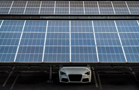 Solar cell panels have installed on the garage roof of old parking lot. Stock-Fotos