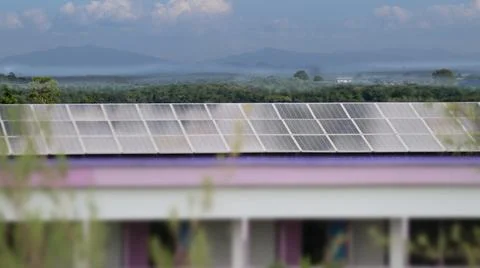 Solar cell panels under the evening sunlight become dirty caused by bird poops Stock Photos