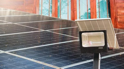 Solar cell panels under the evening sunlight become dirty caused by bird poops Stock Photos