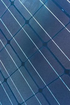 A solar cell pattern close up. Green energy and sustainable electricity res.. Stock Photos