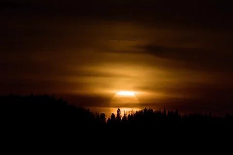 A solar disc in the clouds at an autumn sunset, visible in October from the V Stock Photos