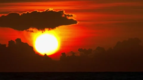 Solar Disk Revealed Through Layered Atmospheric Formations Stock-Footage 342899957