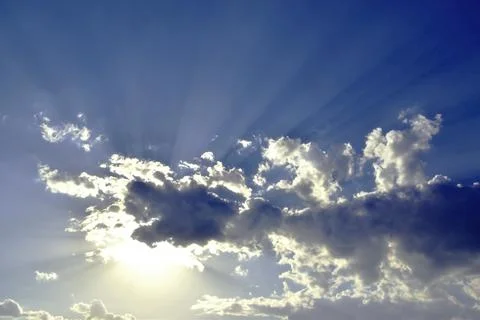 The solar disk sets in the clouds. Evening in the foothills of the Western Ur Stock Photos