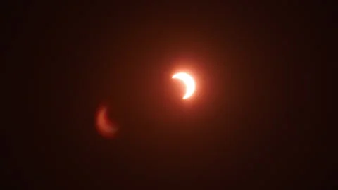 Solar Eclipse 2023 Time Lapse Telephoto with Red Filter Astrophotography Stock-Footage 343073170