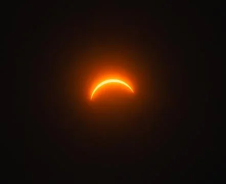 Solar eclipse 2024 with moon almost totally covering the sun. Stock Photos