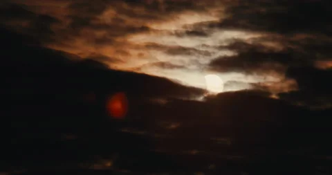 Solar Eclipse between clouds 動画素材 219969507