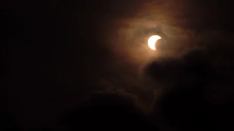 Solar eclipse with cloud and bird Stock Footage 65778554