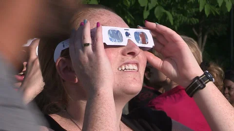 Solar eclipse on college campus and students with telescopes and glasses Stock Footage 37215509