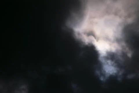 Solar eclipse covered by clouds , in Argentina Stock Photos