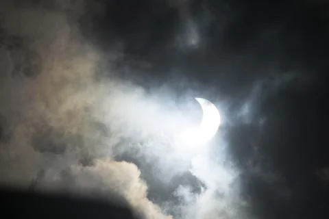 Solar eclipse covered by clouds , in Argentina Stock Photos