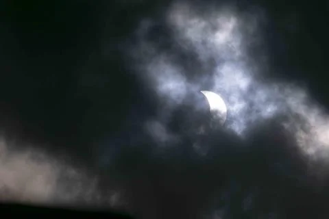 Solar eclipse covered by clouds ,Mar del Plata , Buenos Aires province Stock Photos