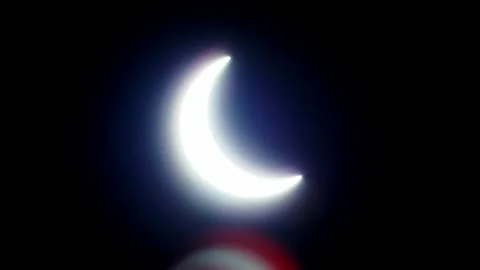 Solar eclipse in the Dubai desert. almost anular phase, full of the Stock Footage 135710787