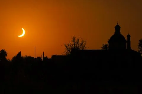 The solar eclipse in El Puig de Santa Maria town, Spain Stock Photos