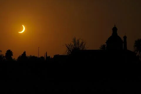 The solar eclipse in El Puig de Santa Maria town, Spain Stock Photos
