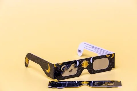 Solar eclipse glasses protecting eyes during celestial events Stock Photos