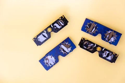 Solar eclipse glasses providing eye protection during astronomical event Stock Photos