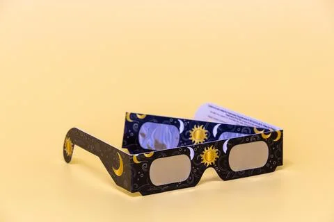 Solar eclipse glasses for safe celestial event viewing Stock Photos