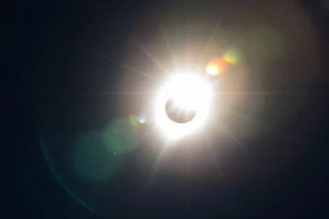 Solar Eclipse with Lens Flare Stock Photos