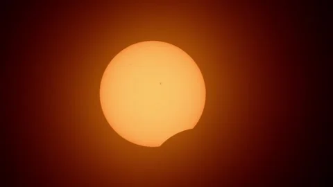 Solar Eclipse. The moon moving in front of the sun Vídeo Stock 272243993