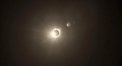 Solar Eclipse. The moon moving in front of the sun Stock Photos