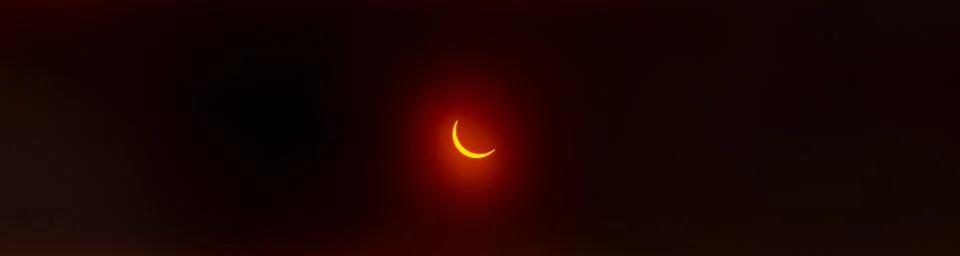 Solar Eclipse. The moon moving in front of the sun Fotos Stock