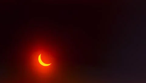 Solar Eclipse. The moon moving in front of the sun Stock Photos