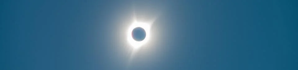 Solar Eclipse. The moon moving in front of the sun Stock Photos