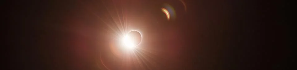 Solar Eclipse. The moon moving in front of the sun Stock Photos