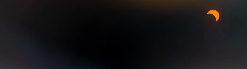 Solar Eclipse. The moon moving in front of the sun Fotos Stock